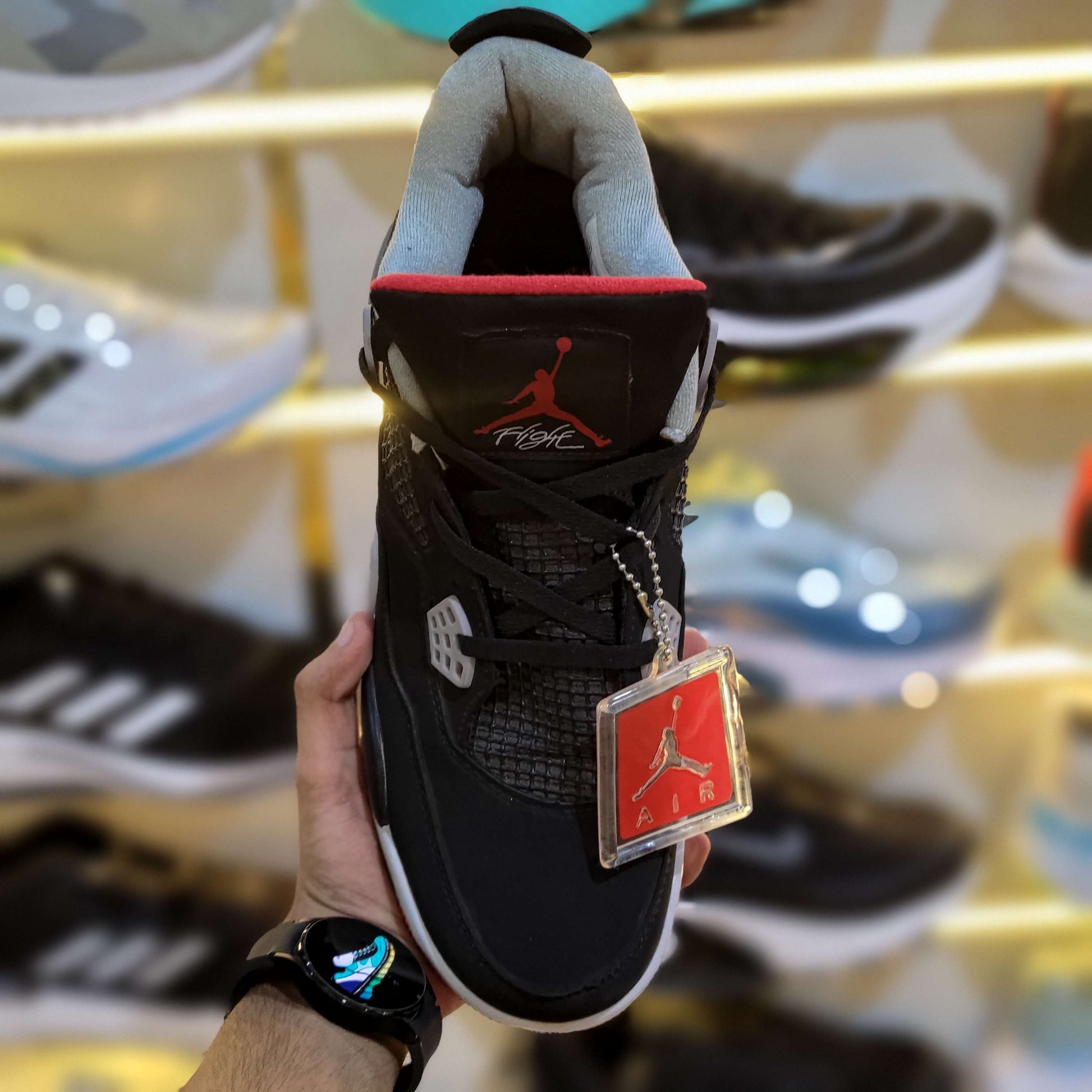 Jordan 4 Retro Bred Premium Sneaker Side Profile - The Shoe Society