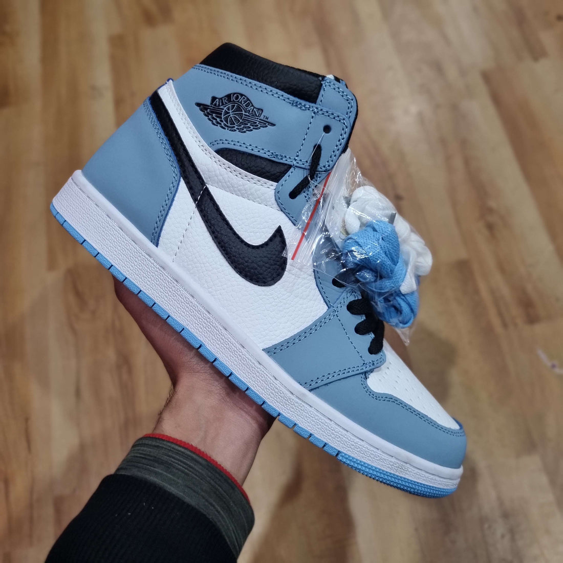 Jordan 1 High Golf University Blue Premium Sneaker Side Profile - The Shoe Society