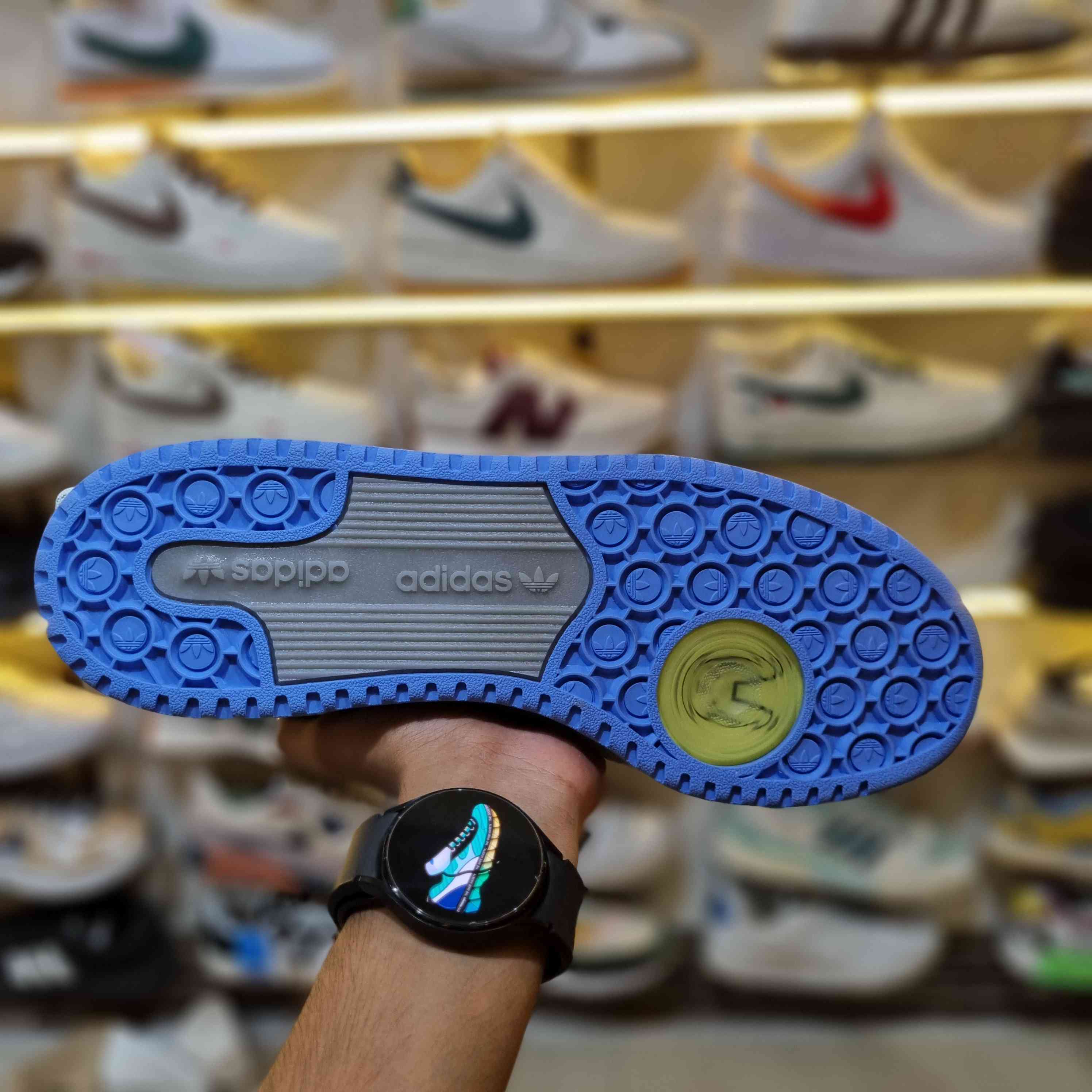 Light-blue retro low-top sneakers with strap – back heel view