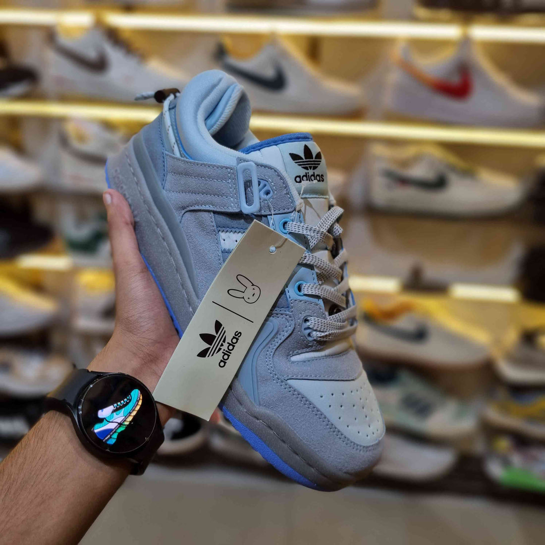 Light-blue retro low-top sneakers with strap – front view