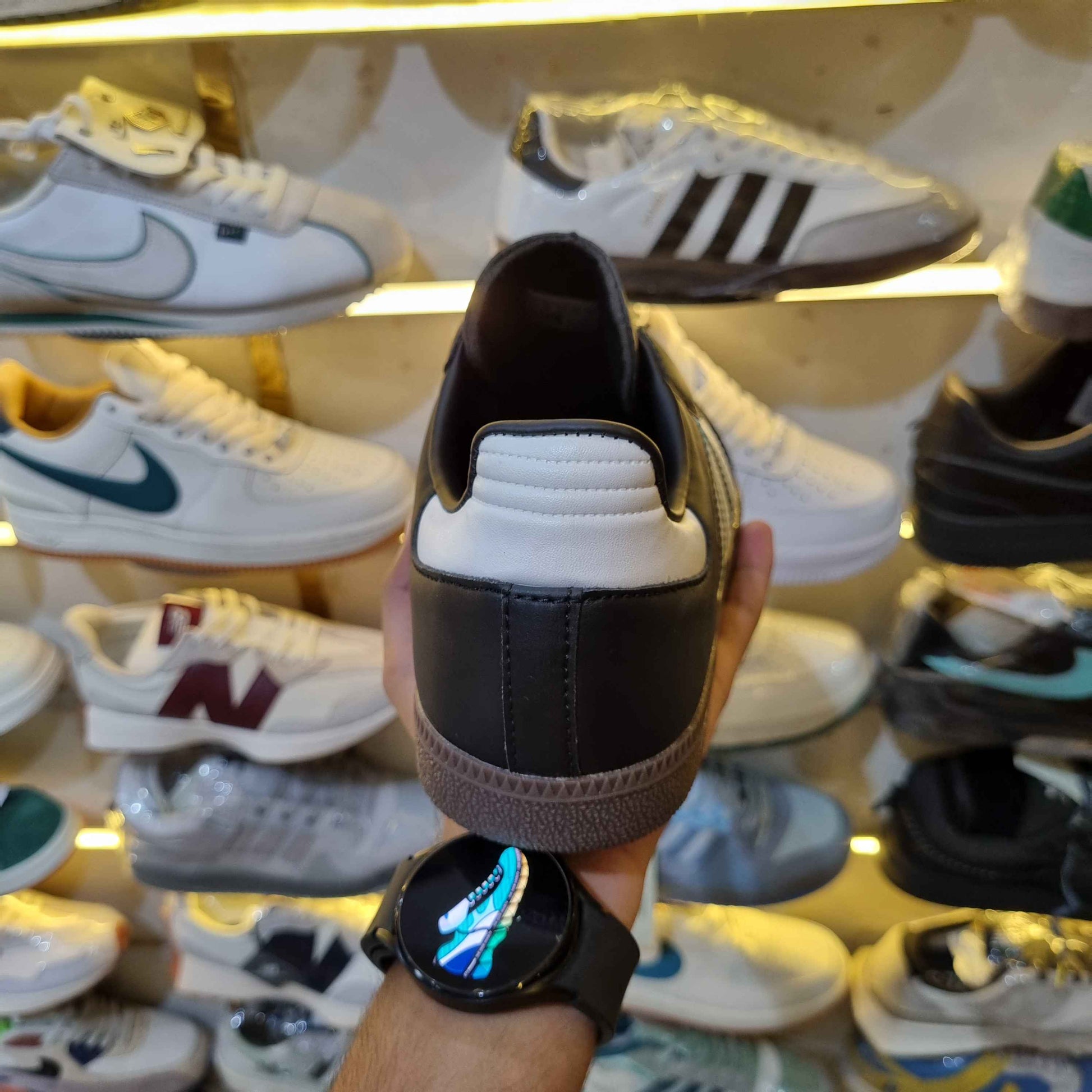 Close-up stitching of retro black-white gum-sole sneakers