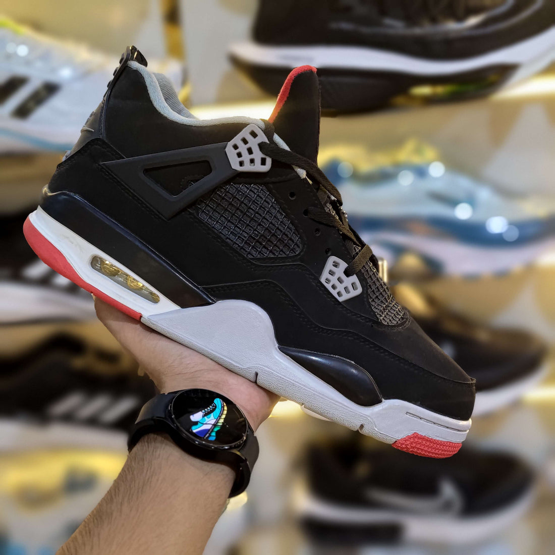 The Shoe Society Exclusive - Jordan 4 Bred
