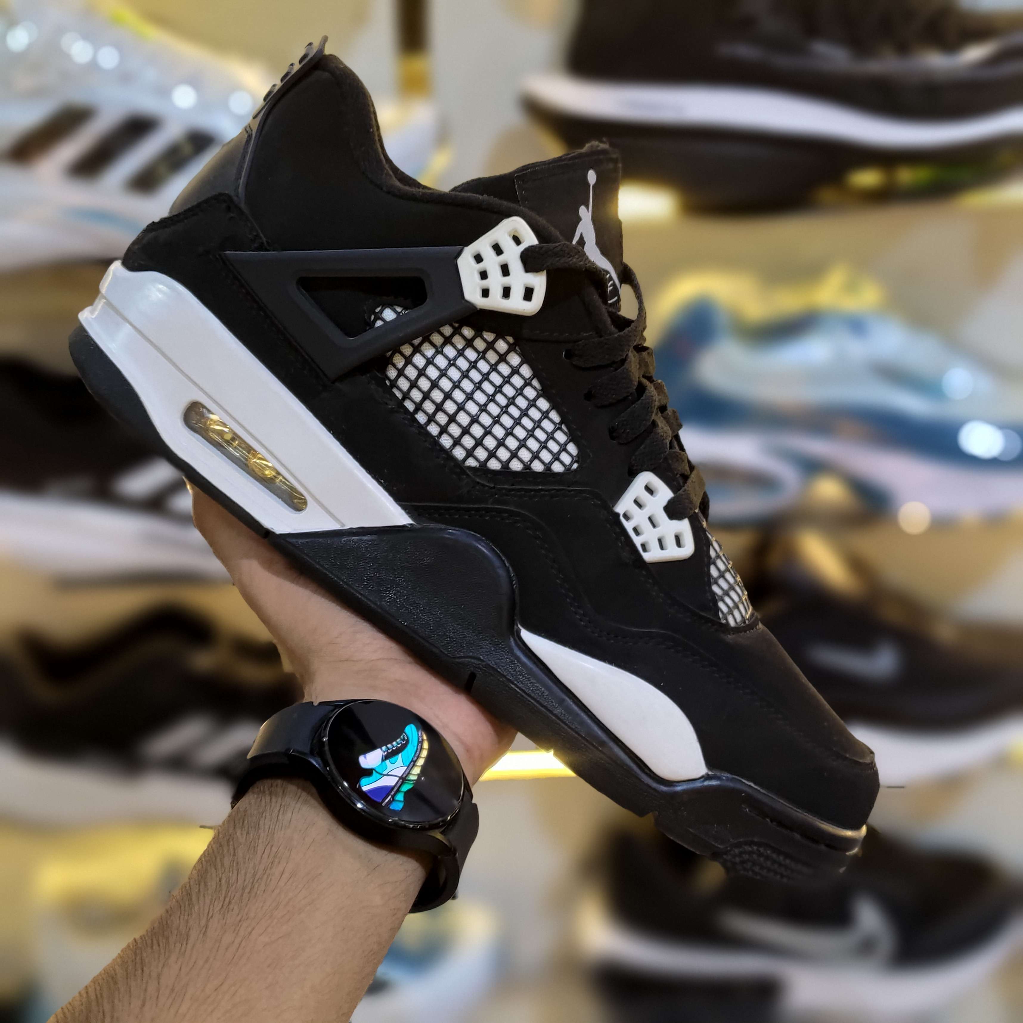 The Shoe Society Exclusive - Jordan 4 White Thunder